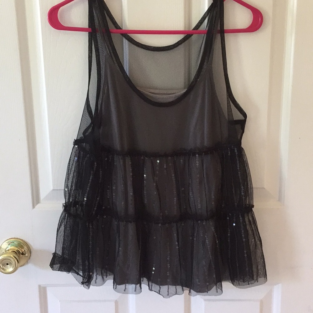 Sheer black tank top.